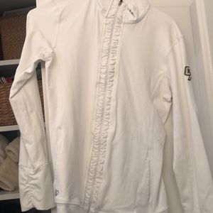 White zip up workout jacket with Cal Poly logo